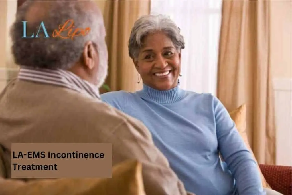 Couple sat smiling at each other - LA-EMS treatment Greater London (City of London)