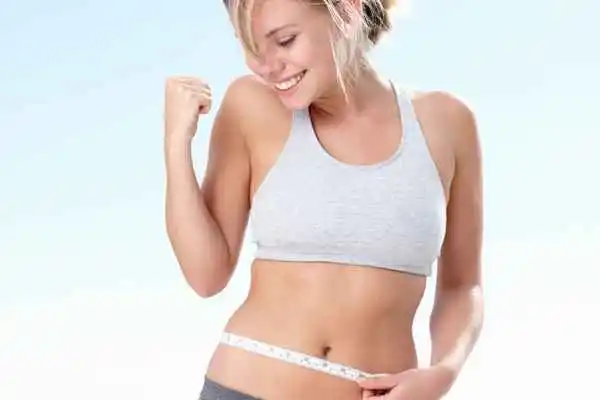 woman happy after fat reduction treatment Greater London (City of London)