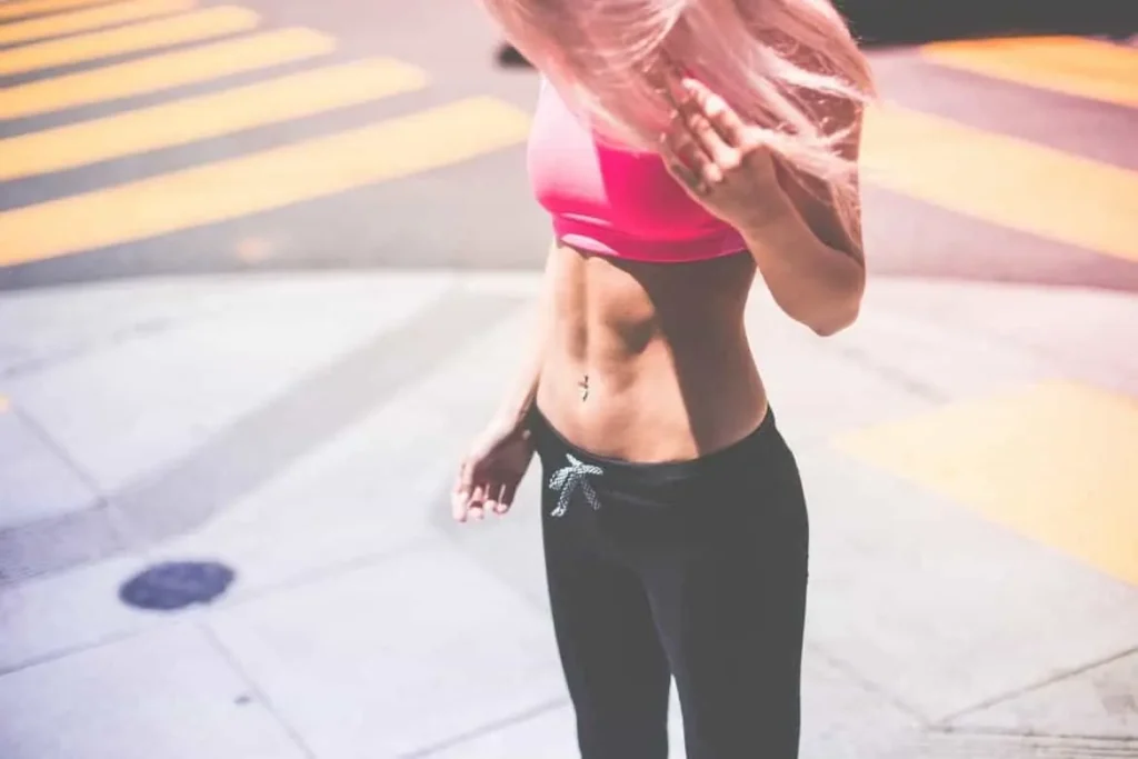 Woman with toned stomach after LA-EMS Body Sculpting Treatment Greater London (City of London)
