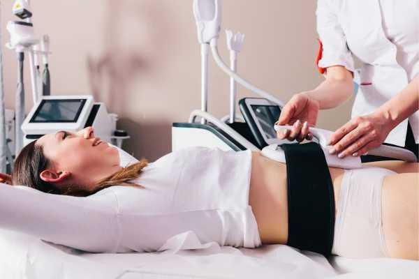 woman having body sculpting to help improve her body image and her mental health Greater London (City of London)